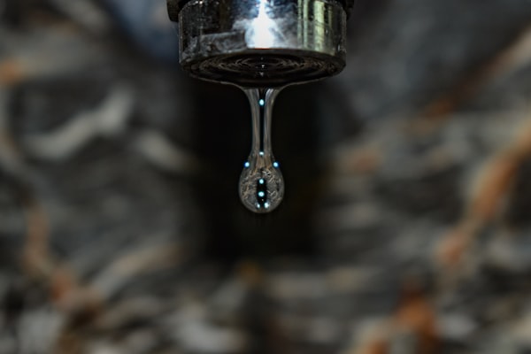 Water dripping from a faucet